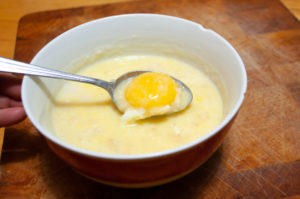 Congee with a soft cooked egg yolk